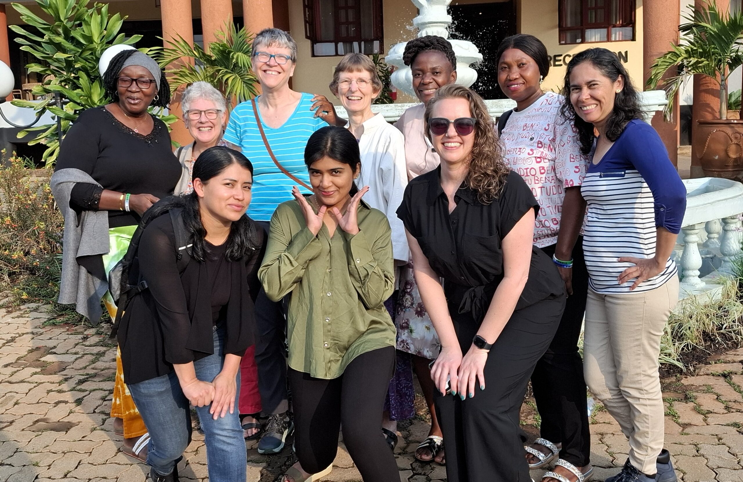 Some RSWR staff stand together in Vihiga County, Kenya